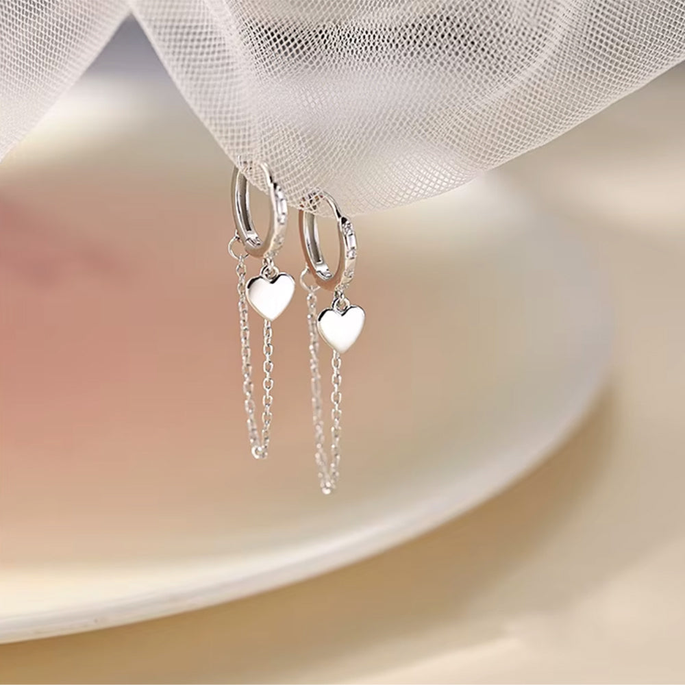 Ohrringe aus 925er Sterling-Silber, fesselndes Herz mit Zirkonia